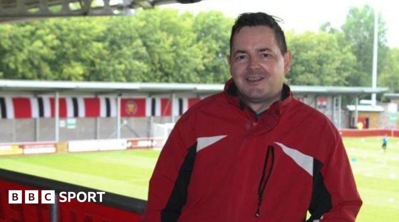 A vibrant football match scene showing fans enjoying the game together.