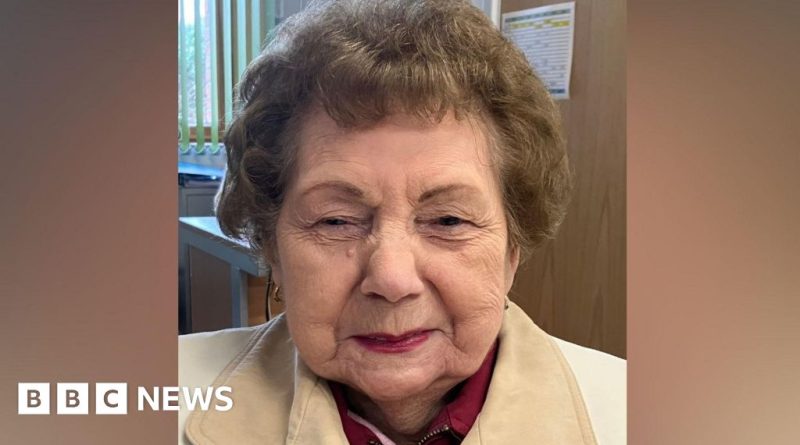 A courtroom scene focusing on professionals discussing serious legal matters related to murder charges against an elderly man.