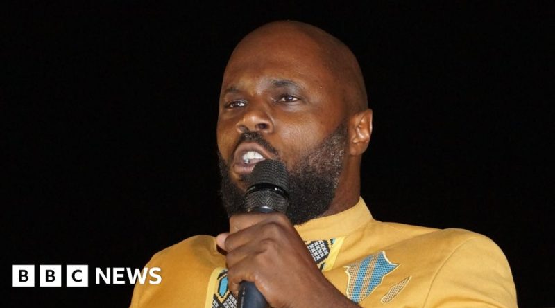 A diverse group of professionals in business attire discussing Keba Seba's arrest.