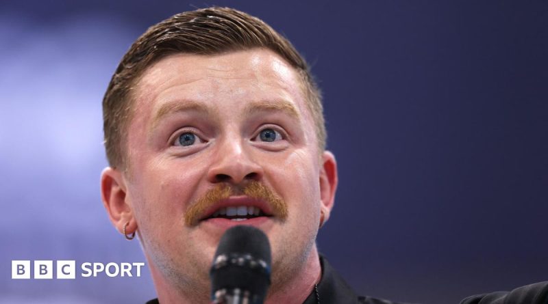Adam Peaty swimming comeback training with teammates in a pool.