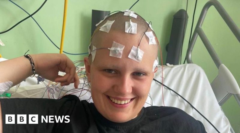 A group of diverse medical professionals discussing a rare medical condition diagnosis with AI technology.