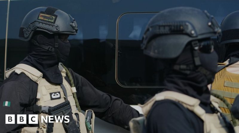 Professionals discussing Nigeria airstrike civilian casualties at a conference.