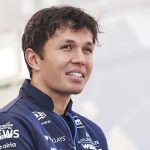 Alex Albon preparing for the Miami Grand Prix, surrounded by a lively atmosphere.
