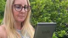 A group of professionals discusses Amazon Kindle support in an office setting.