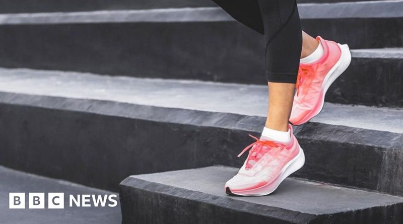 Professionals discussing daily health guidelines in an office setting.