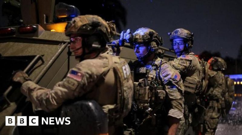 Security personnel oversee the press dinner shooting incident involving the press dinner shooting suspect.