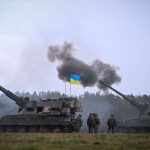 Emergency responders at the scene of the St. Petersburg cafe explosion.