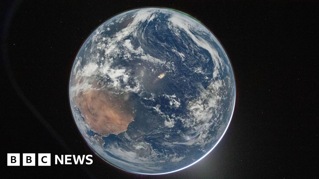 Astronauts in a spacecraft during a communication blackout behind the Moon.