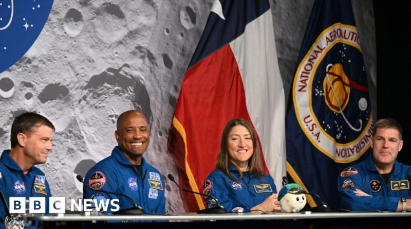 Astronauts discussing their Artemis II Moon mission experiences in a press conference.