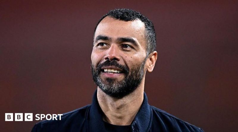 Ashley Cole coaching journey with diverse football coaches discussing strategies.