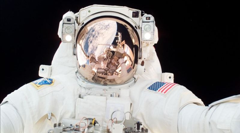 Astronauts performing exercises to prevent back pain in space.