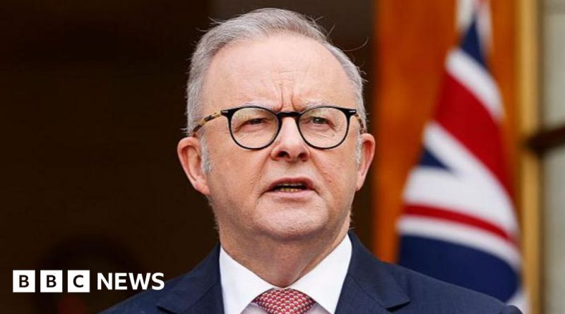 A group of professionals monitoring the Australia fuel supply situation in a control room.