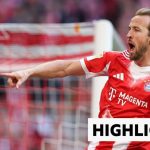 Bayern Munich players celebrating their Bundesliga title victory on the field.