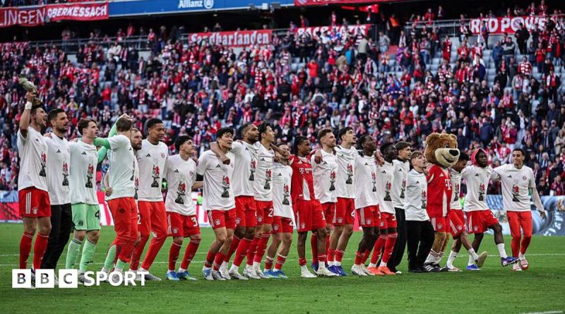 Bayern Munich players celebrating their Bundesliga title victory together.