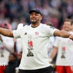 Bayern Munich celebration with players in cockatoo T-shirts after a title win.