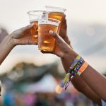 Diverse professionals enjoying beer, highlighting beer brain health benefits.