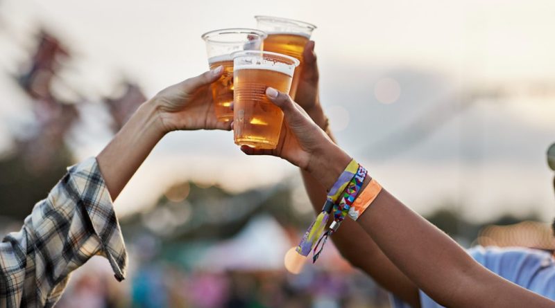 Diverse professionals enjoying beer, highlighting beer brain health benefits.