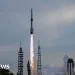 Blue Origin rocket launch failure investigation with engineers observing.