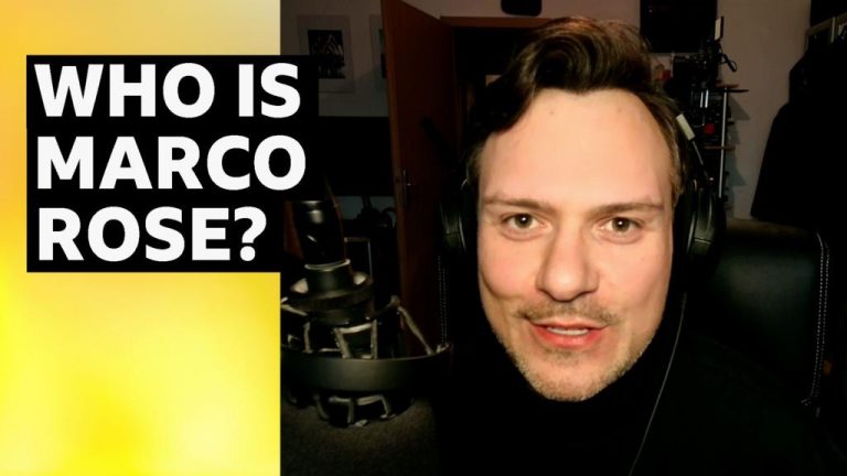 Marco Rose discussing strategies with his team in a football training setting.