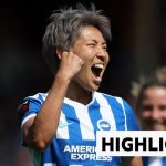 Brighton and Manchester City players compete in an intense WSL match.