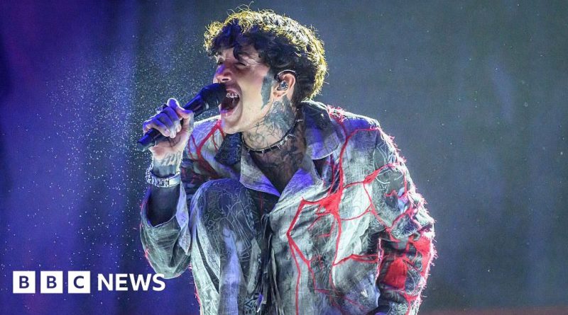 Bring Me The Horizon musicians in a studio working on their anniversary album.
