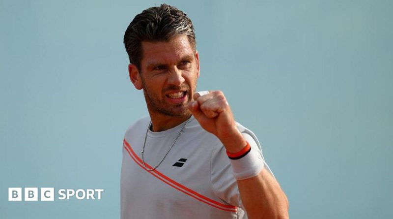 Cameron Norrie Madrid Open match showing players in action.