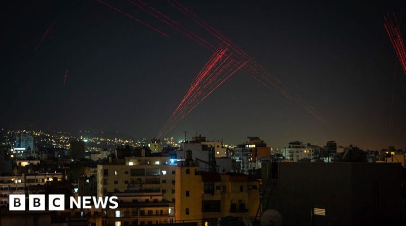 Professionals in a meeting discussing the Lebanon Israel ceasefire.