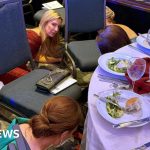 Attendees at the correspondents' dinner seeking safety during gunshots.