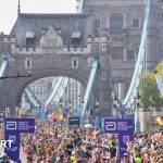 Group discussing London Marathon choir exclusion, showcasing diverse opinions.