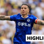 Excited football fans celebrating Chelsea's FA Cup final victory.