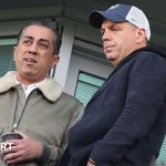 Crowd in a football stadium capturing the tension of Chelsea leadership challenges.