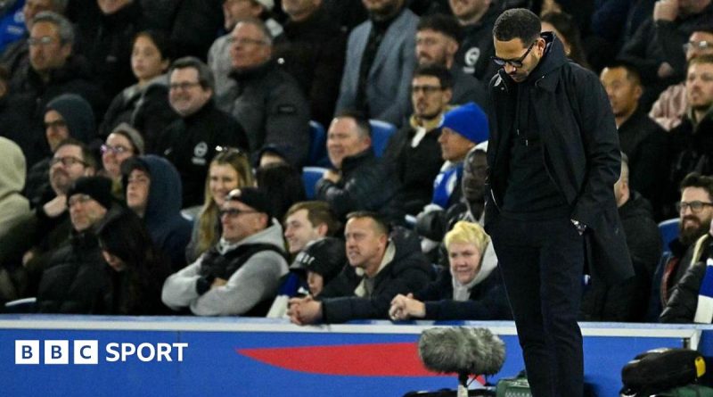 Coaches discussing strategies for Rosenior at Chelsea amid uncertainty.