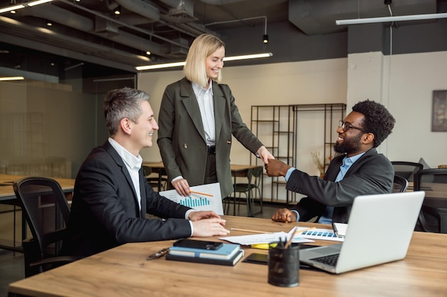 Business professionals discussing China's economy growth in 2023.