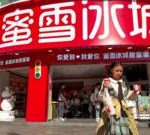 A diverse group enjoying hotpot and bubble tea, highlighting China's new exports.