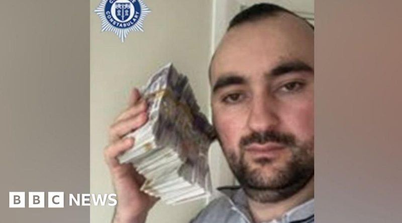 Professionals discussing the Primark burglary scheme and security measures in an office.