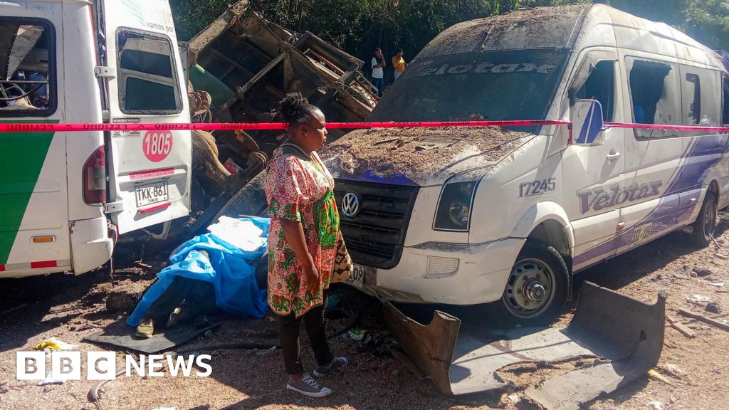 Emergency responders at the site of the Colombia bus bombing incident.