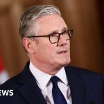 Professionals discussing march chant concerns affecting community safety.