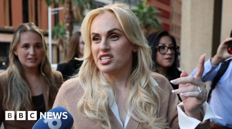 A courtroom scene depicting the tension of Rebel Wilson's defamation claims.