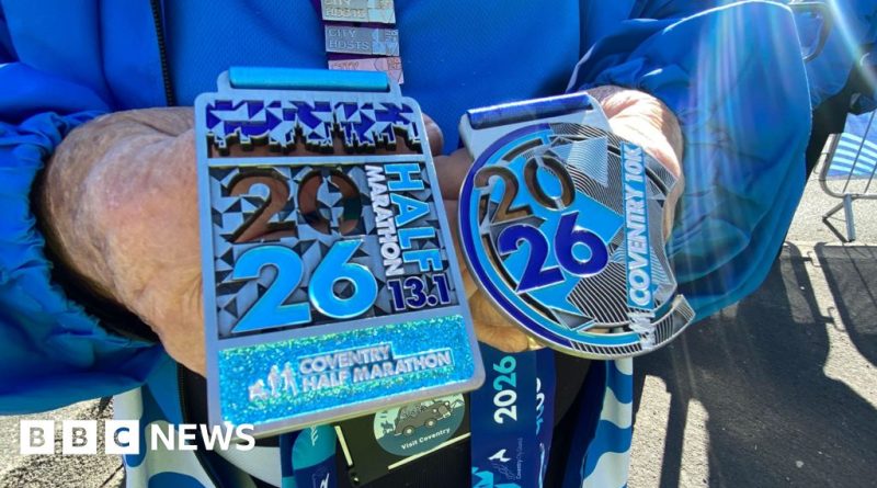 Runners in the Coventry Half Marathon displaying focus and determination.