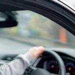 A meeting about car finance compensation delays with professionals in business attire.