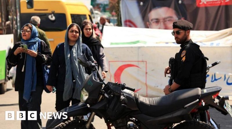 Diplomatic efforts in Iran with diplomats discussing peace agreements.