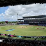 Cricket match scene showing injury concerns about dangerous pitch.
