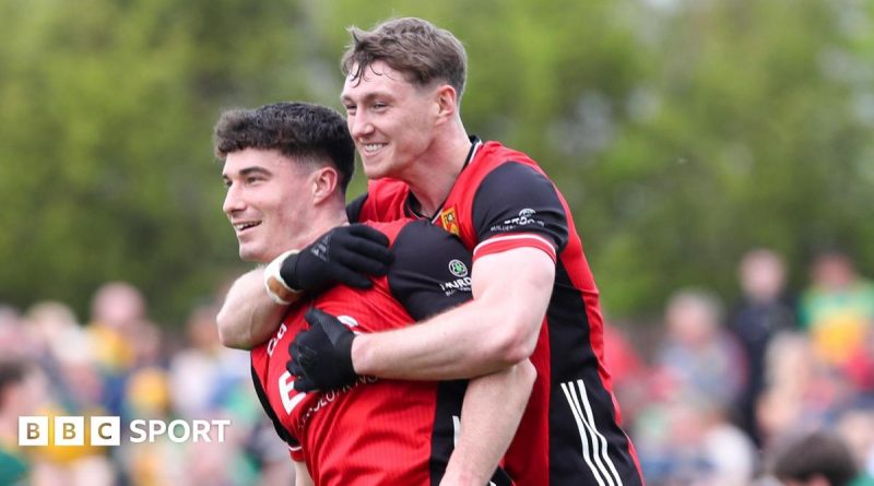 Exciting football match scene highlighting the Ulster Championship upset.