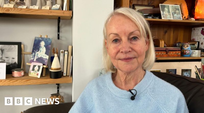 A woman standing on a sidewalk after an e-bike accident, focusing on e-bike accident injuries.