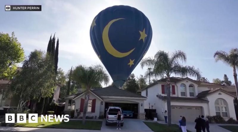 A hot air balloon emergency landing in a backyard in California.