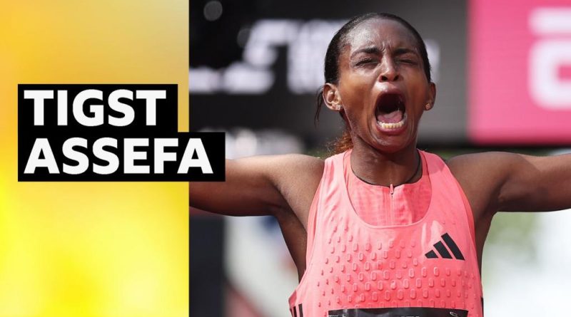 Ethiopian runner Tigst Assefa breaks women's marathon record during race.