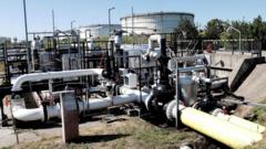 Professionals in a meeting discussing the EU Ukraine loan approval.