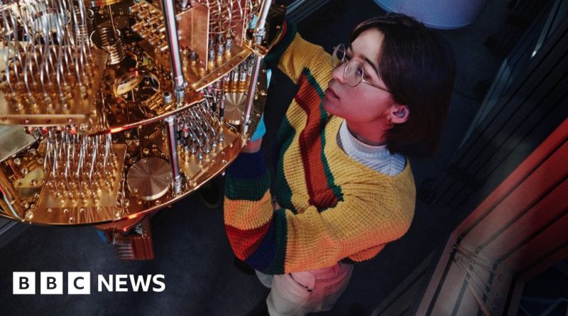 Professionals discussing quantum computing technology in a modern office setting.