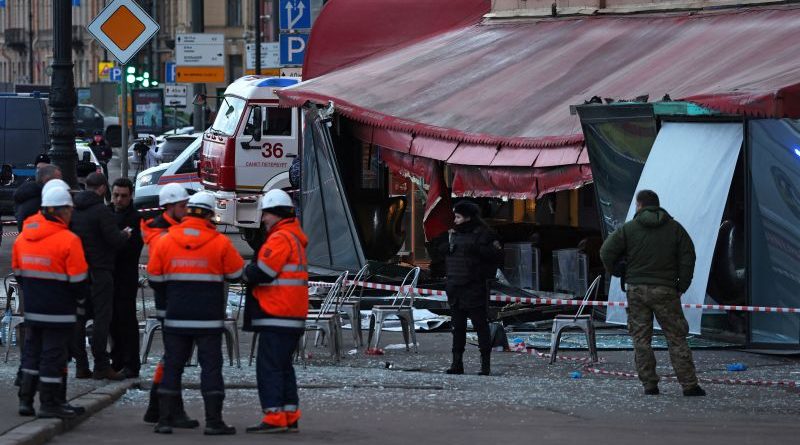 Emergency responders at the scene of the St. Petersburg cafe explosion.