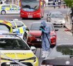 A mother waits outside a hospital, hoping for her son's recovery after the Golders Green stabbing incident.